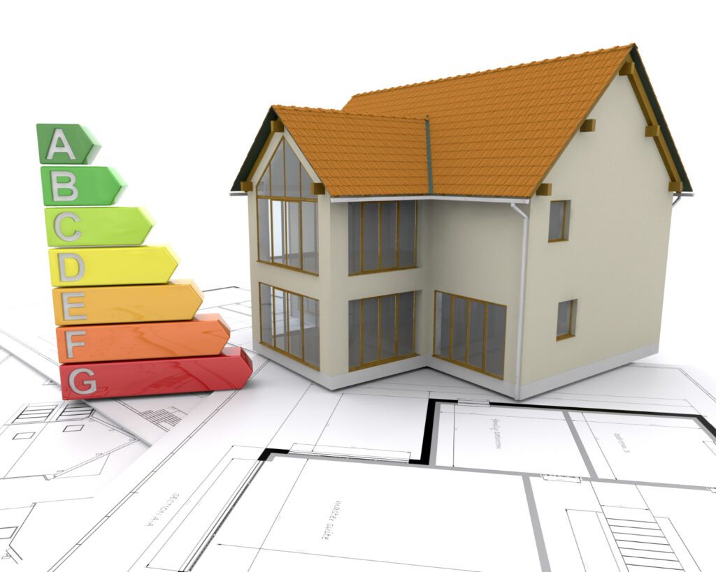 3D illustration of a two-story house with a brown tiled roof and beige exterior walls, displayed on architectural blueprint drawings. To the left, there is a vertical energy efficiency rating chart with colored bars ranging from green to red, labeled A to G, indicating levels from most to least energy-efficient